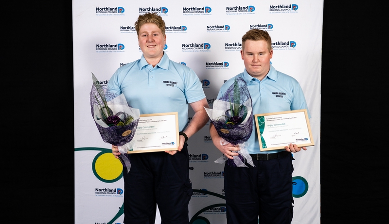 Award recipients with certificates.