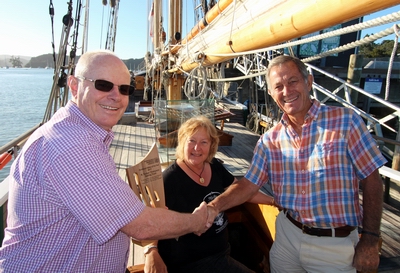 Presentation of trophey to trustees on board the R. Tucker Thompson.