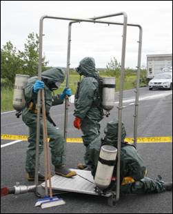 Regional Council hazardous waste team in action.