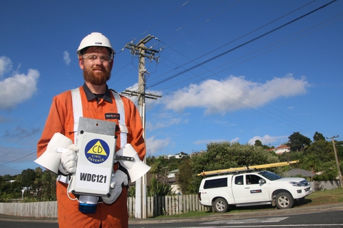 Electrician holding tsunami siren.