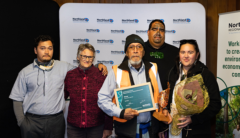 Group of people with prizes.