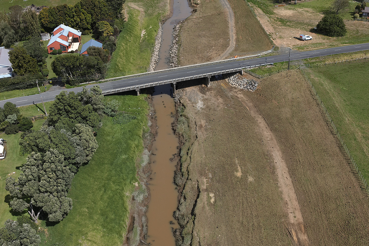 Aerial view of a road bridge over a river.