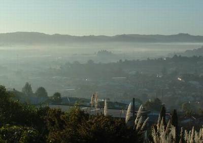 Photo of Whangarei with an inversion layer over the city.
