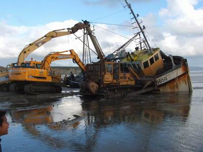 Recovering a beached trawler off 90 Mile Beach.