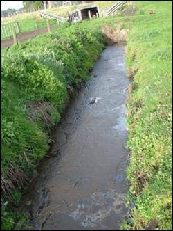 Non-compliant underpass discharge.