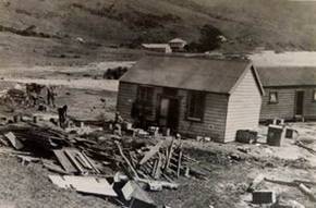 Tsunami damage to store on Ahipara waterfront.