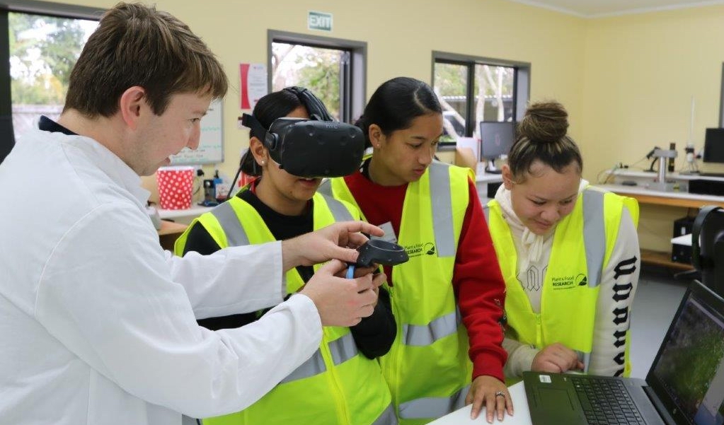 Student using virtual reality goggles.