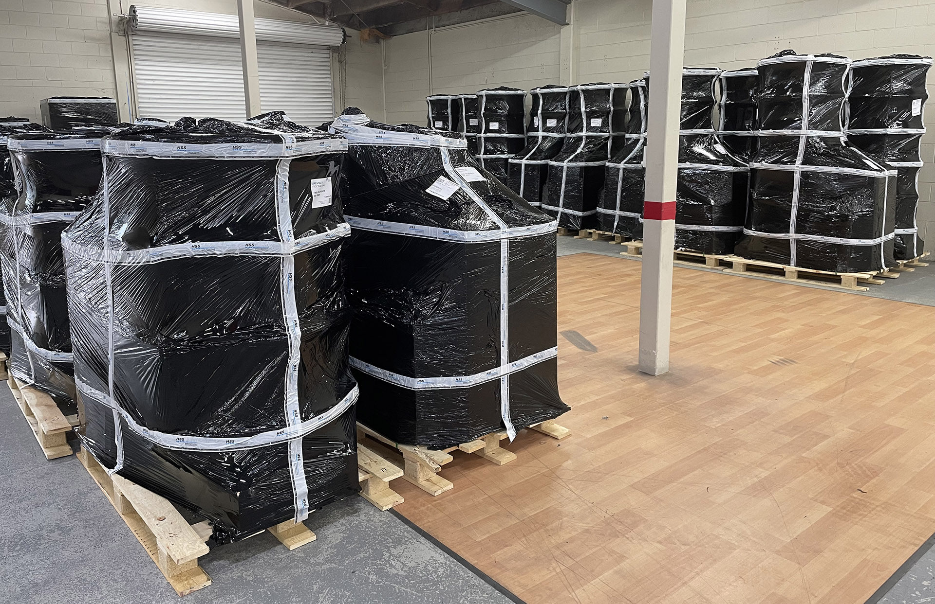 Sirens in packaging stored in warehouse.