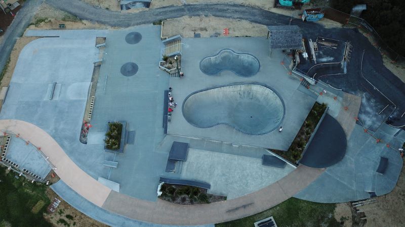 An early evening drone shot of the new skating area at the Mangawhai Activity Zone.  The light concrete is the newest addition, with the dark upper right area still to be completed. (Photo credit: Mangawhai Activity Zone).