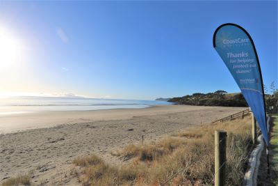 CoastCare sign at Waipu Beach.
