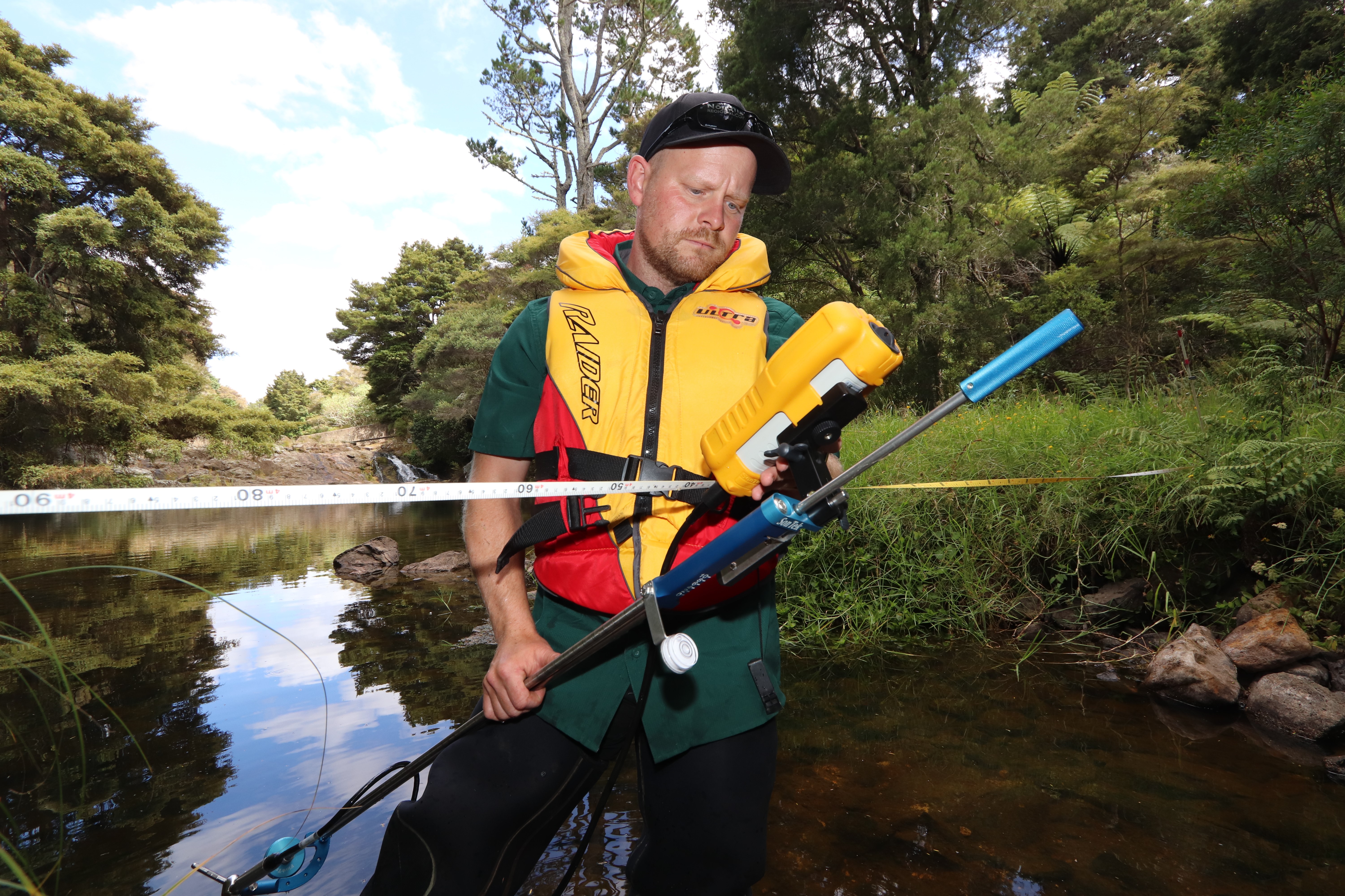 Monitoring Officer checks a gauge reading.