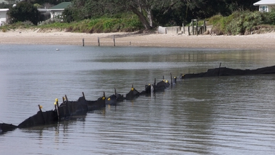 Silt fence in water.