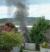 Smoke from a backyard fire.