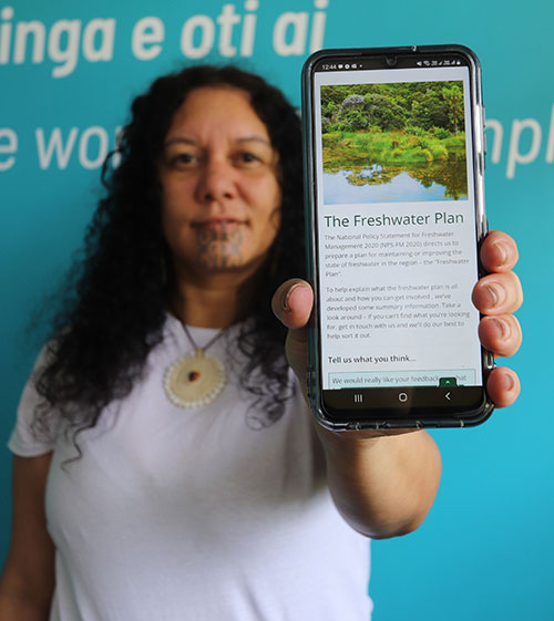 Chair Tui Shortland with Freshwater Plan displayed on mobile phone.