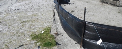 Silt fence on beach.