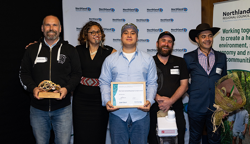 Group of people with prizes.