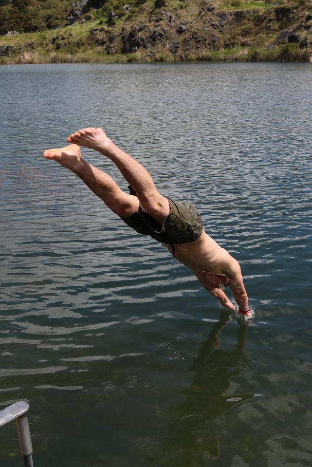 Boy diving into the lake.