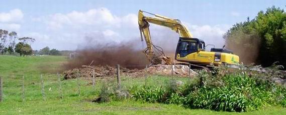 Dust from a digger working on a farm.