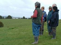 Farmers assessing land to prepare farm management plans.