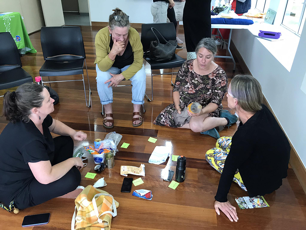 Four women in a breakout group.
