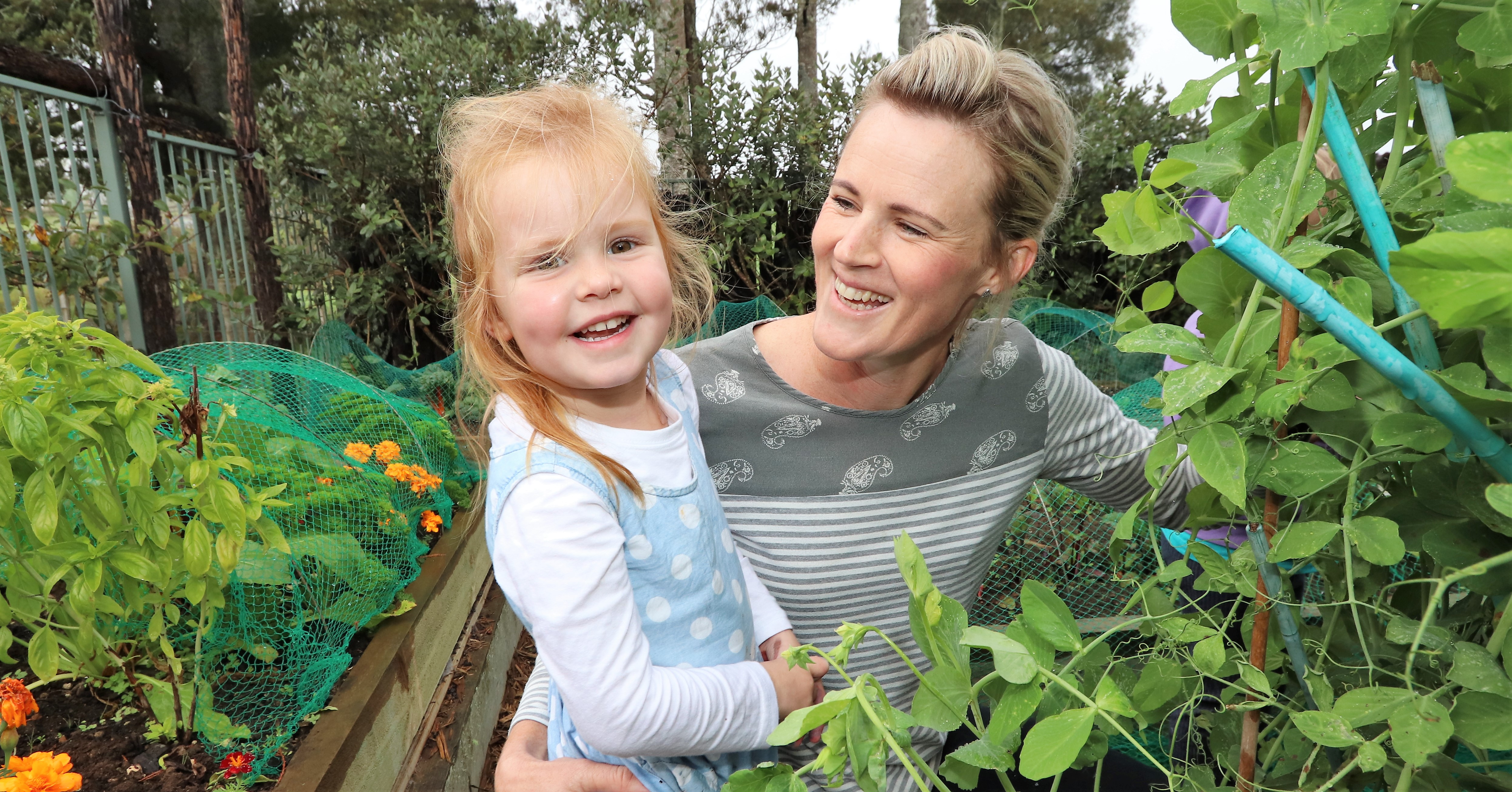 Former Head Teacher teacher Anna Alexander and three-year-old Emily Pearson.