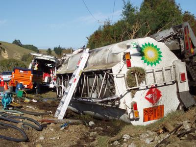 An overturned truck leaking petrol was a potential environmental incident.