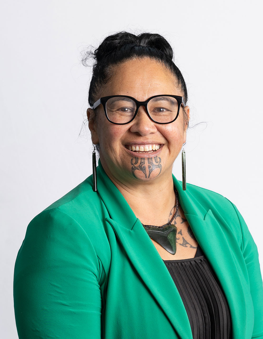 Auriole Ruka, profile headshot.