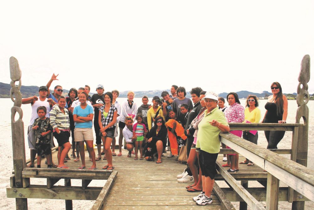 Group of people on a wharf.