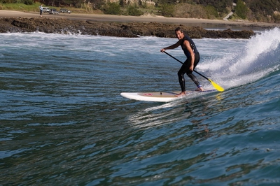 Surfing on paddleboard.