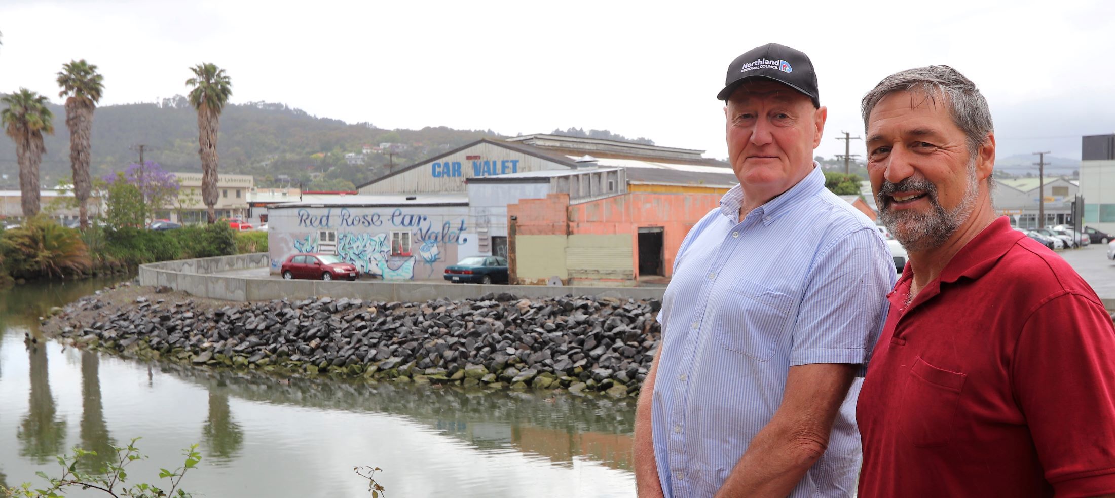 Regional councillor Jack Craw, left, and Rivers and Natural Hazards Manager Joseph Camuso, check out a new flood wall expected to significantly increase flood protection for a key part of Whangarei’s central business district.