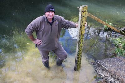 NRC officer in the drought-affected Awanui River.