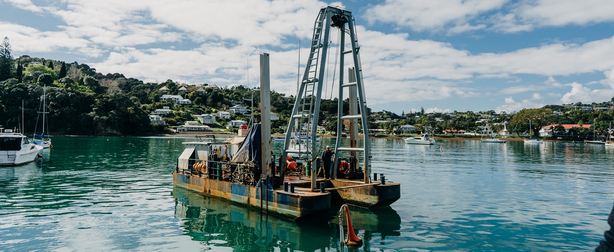 Mooring contractor barge.