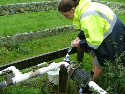 Sampling groundwater.