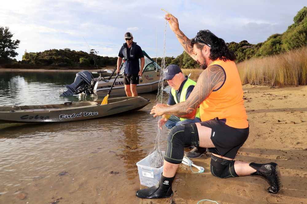 We're part of a multi-agency team responding to a possible koi carp sighting in Lake Taharoa.